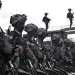 30202-ilustrasi-brimob-anggota-brimob-ikut-pengamanan-ktt-g20-di-bali.jpg